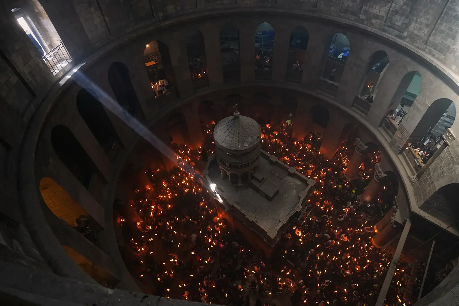 An AP reporter spends the night locked inside Jerusalem's holiest church with clergy and pilgrims