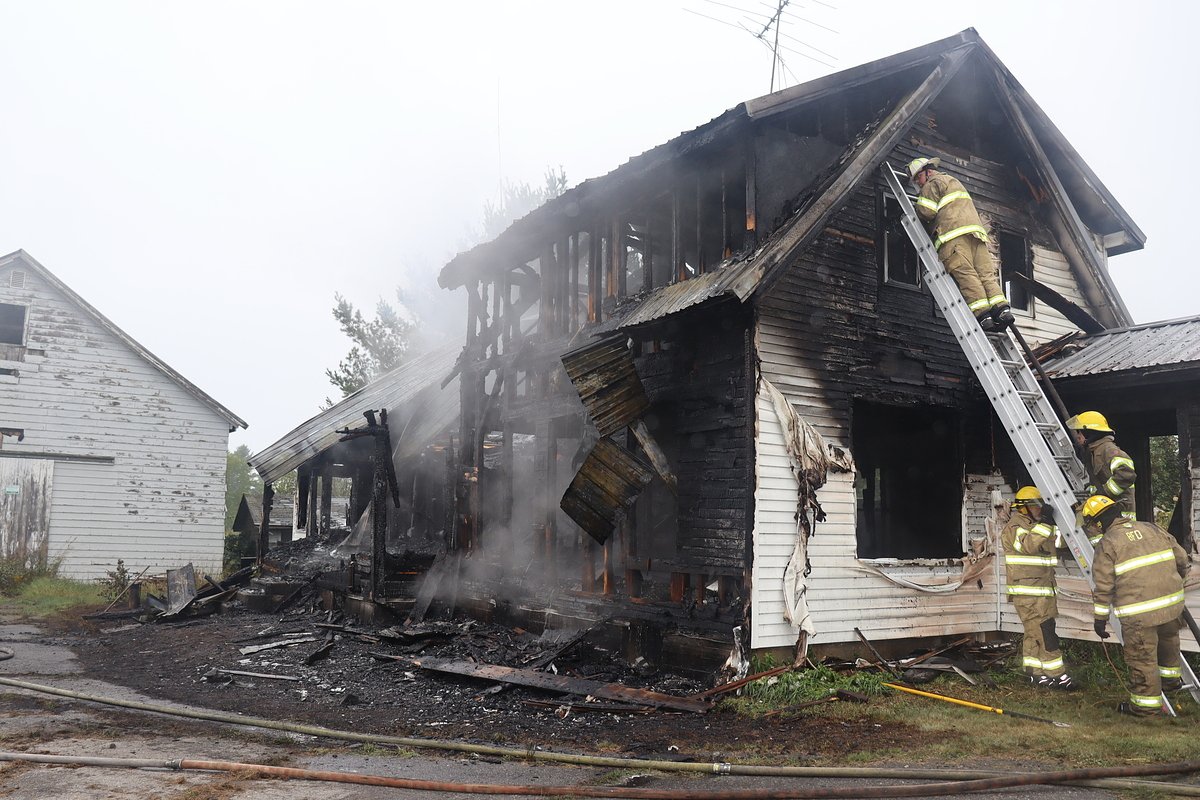Firefighters save Maine barn from nearby house fire