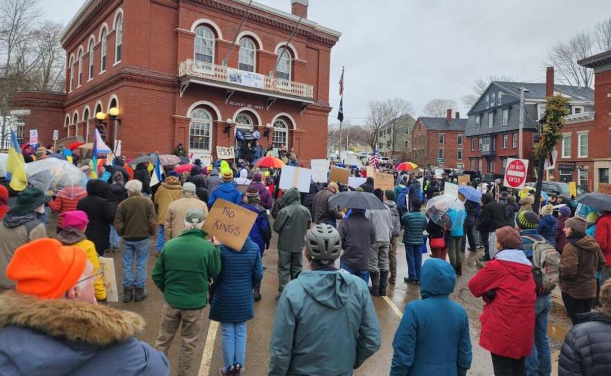 Why I stand on the corner holding a sign