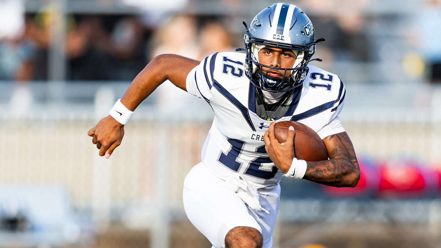 Soph QB throws for over 200 yards, adds six TDs in dominant divisional win
