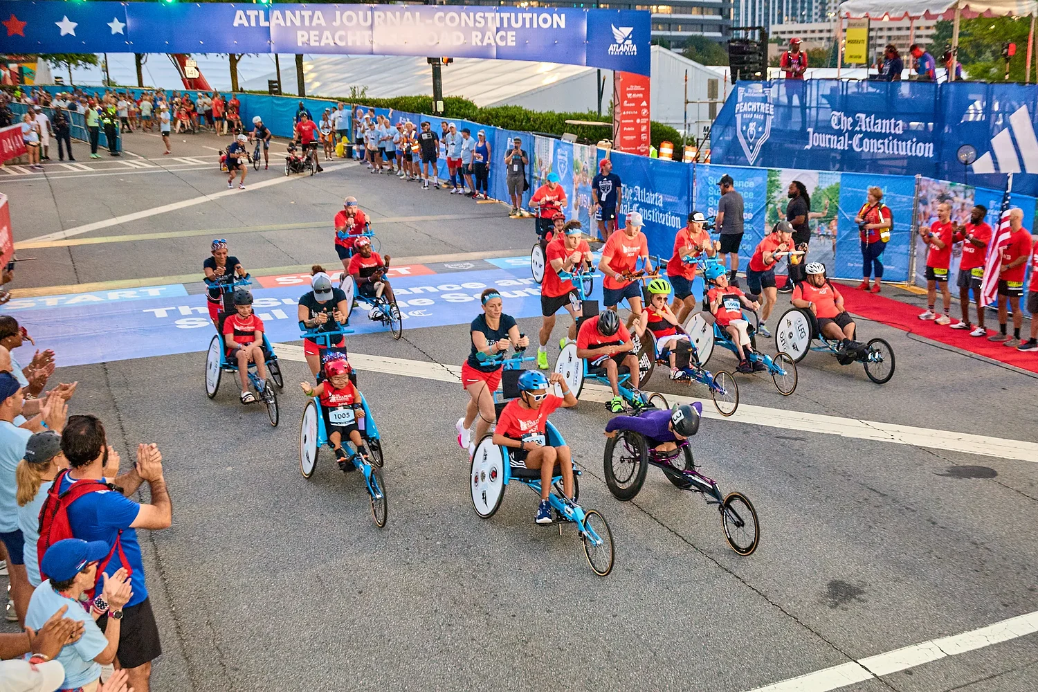 Kyle Pease Foundation push teams tackle the heat, hills, and humidity at the Peachtree Road Race