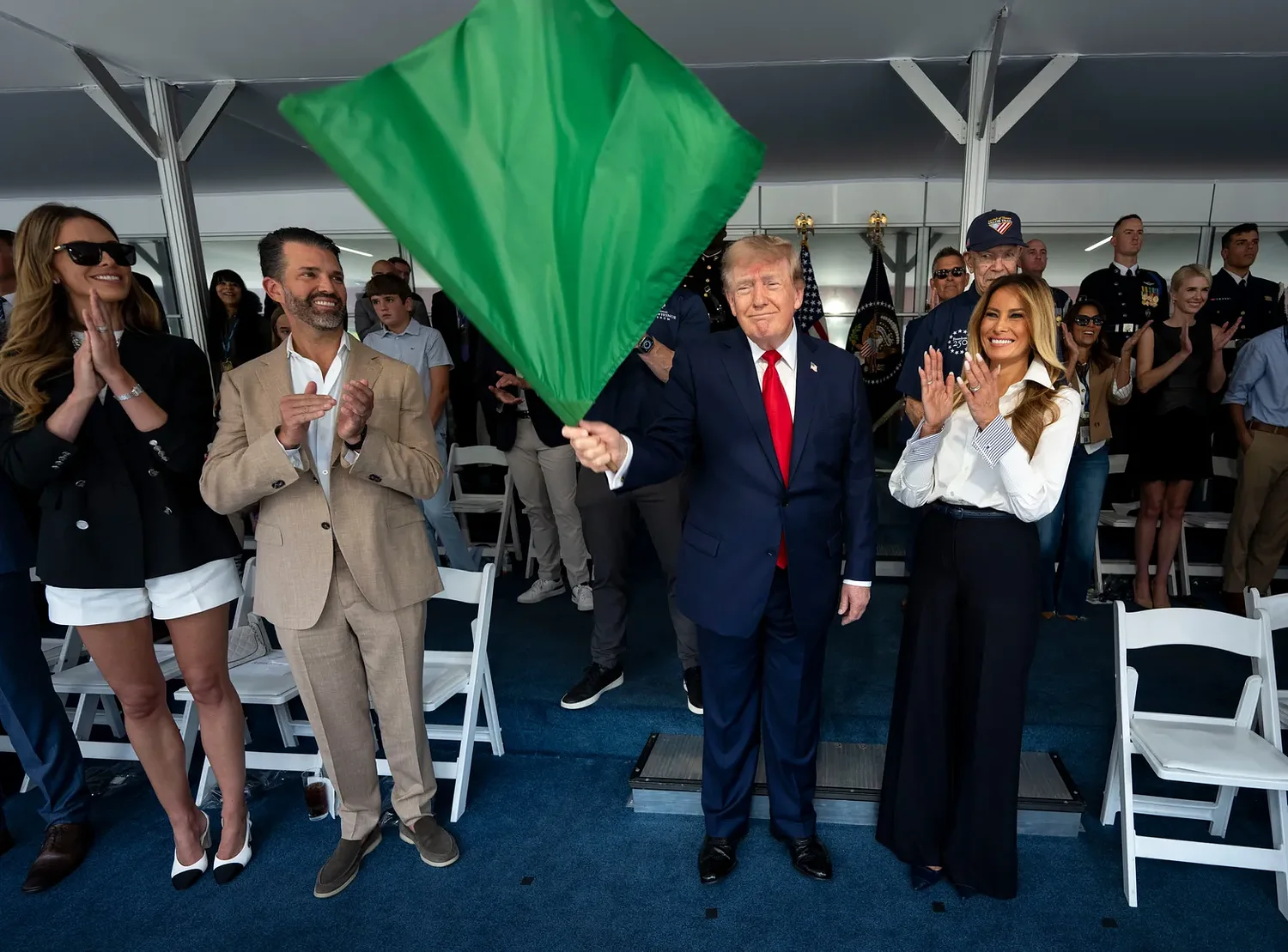 Trump waves the green flag to start the IndyCar race as drivers zoom through Washington's streets