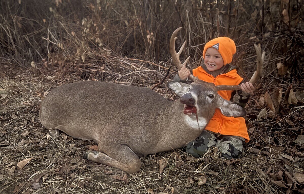 7-year-old shoots first buck. It was bigger than most shot in Maine.