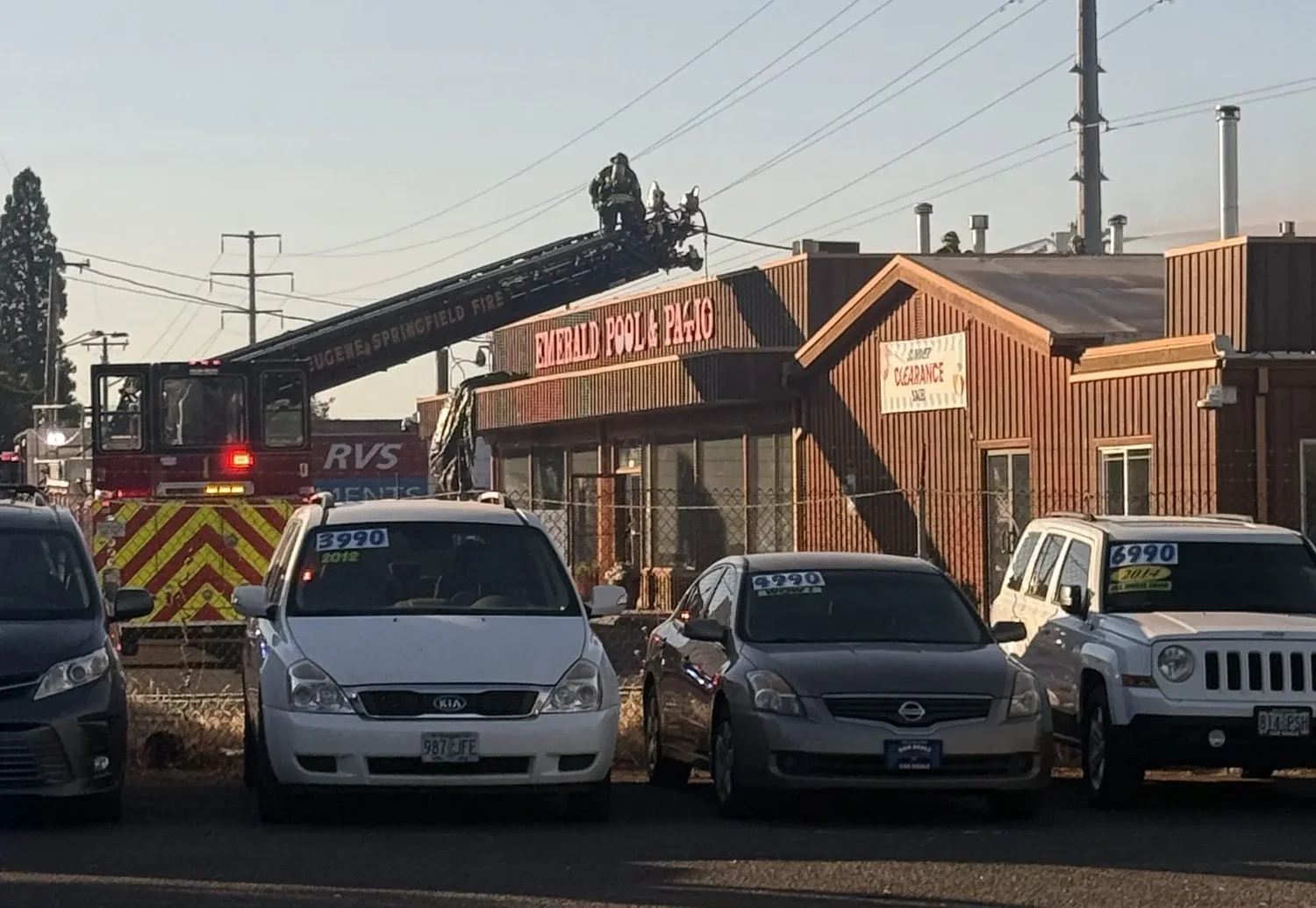 Fire near Highway 99 in Eugene destroys vacant home, damages businesses