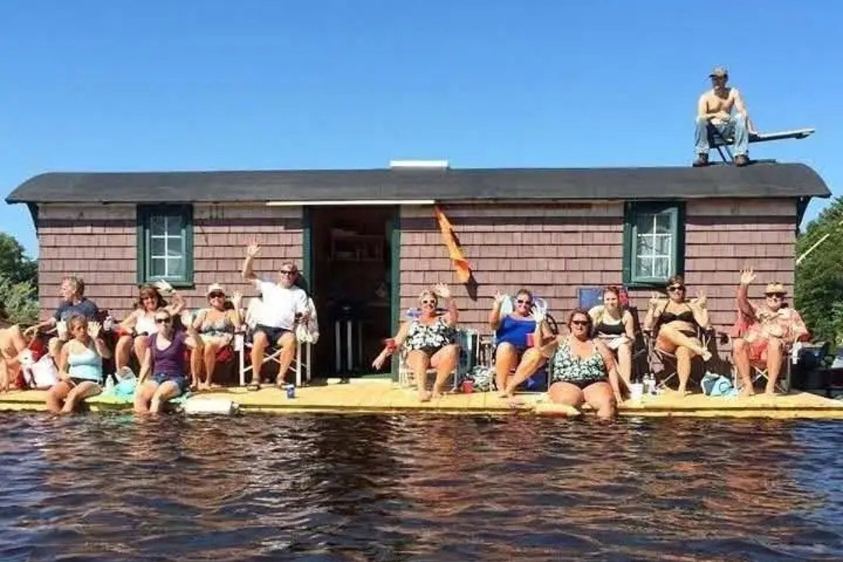 Supporters rally behind Maine floating camp after owners forced to remove it from river