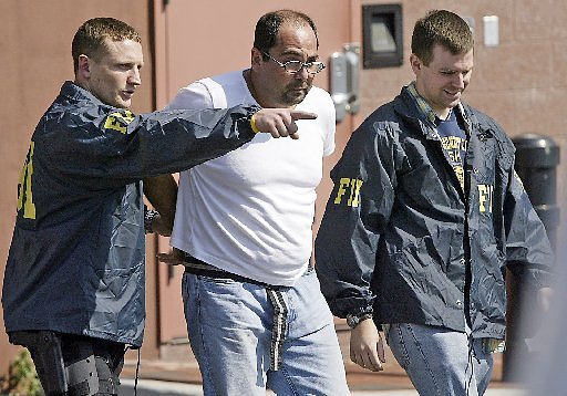 Ex-mob bookie got a government job — plus a free pool, bags of cash and now another prison term