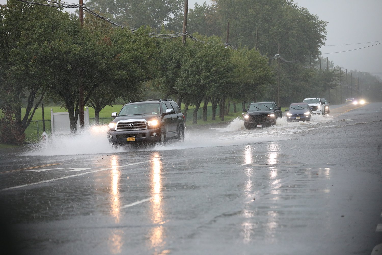 Flash flood warning issued for Staten Island as nighttime storms loom; railway service resumes