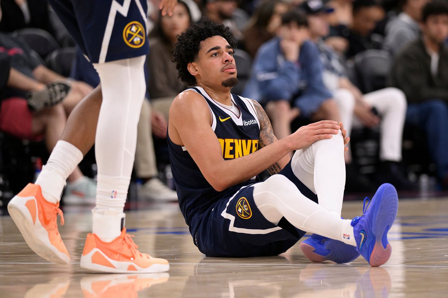 Nuggets guard/forward Julian Strawther to be re-evaluated in 6 weeks after spraining left knee