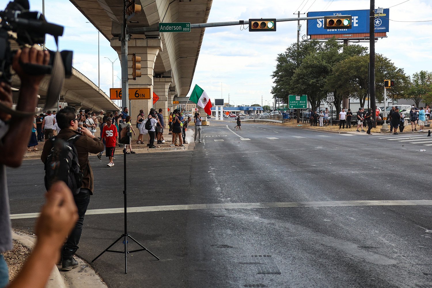 A surge of ICE arrests and the shooting of a Venezuelan man strike fear into Austin neighborhoods