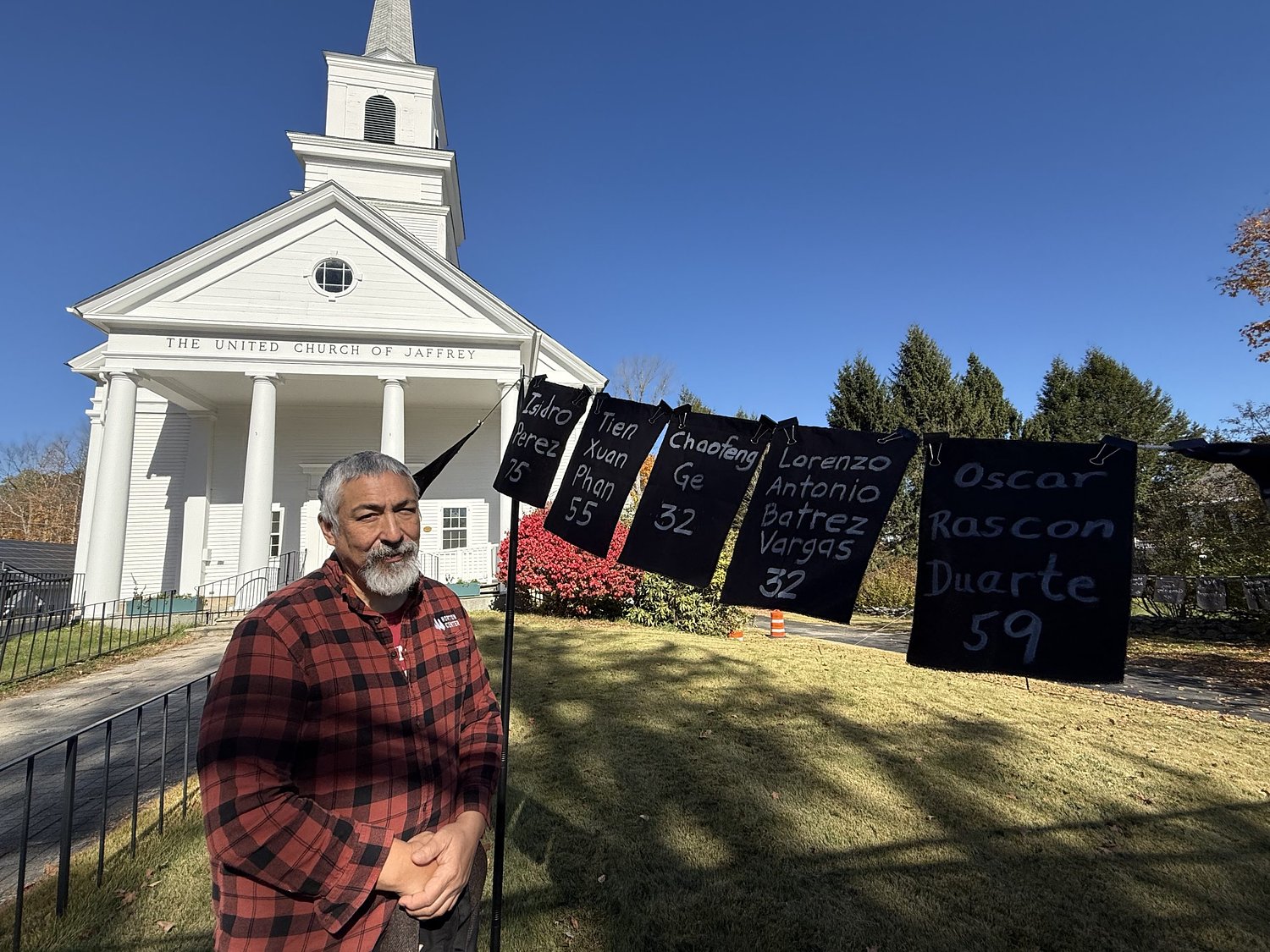 Local church's black flag installation honors ICE detainees who died in custody