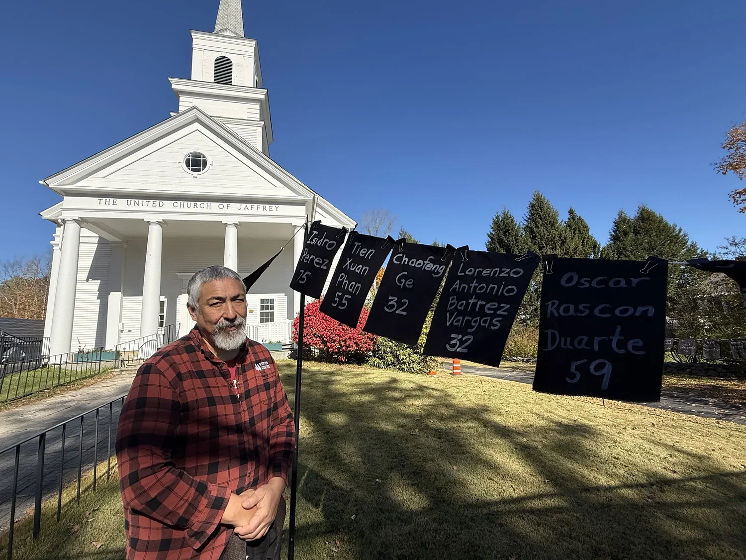 Local church's black flag installation honors ICE detainees who died in custody