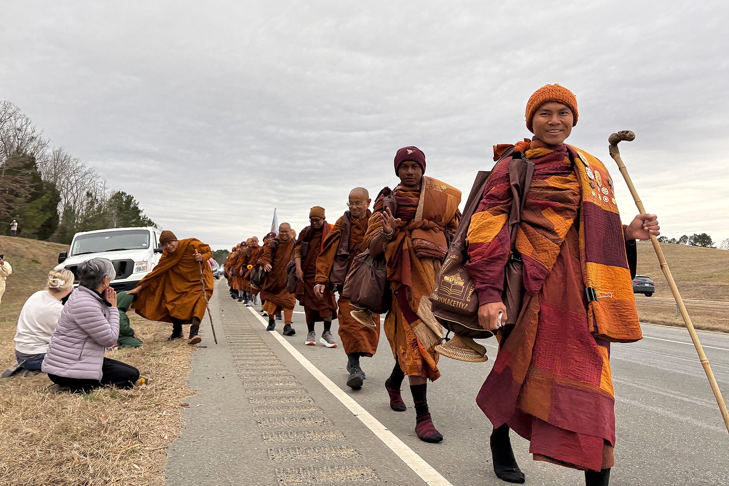 Thousands show their respect for Buddhist monks on a Walk for Peace
