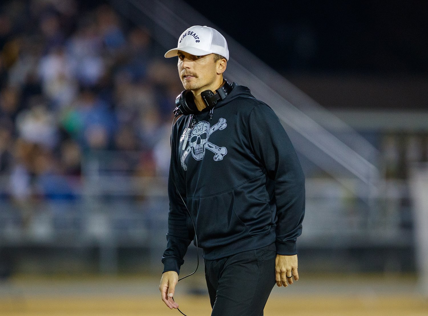 Suspended football coach will remain as teacher