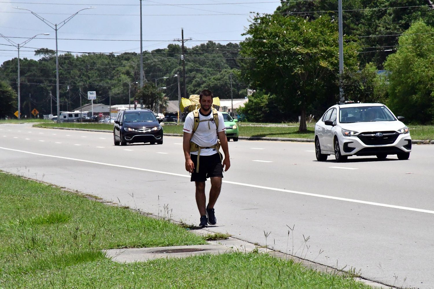 Man walking outline of the U.S. reaches South Mississippi