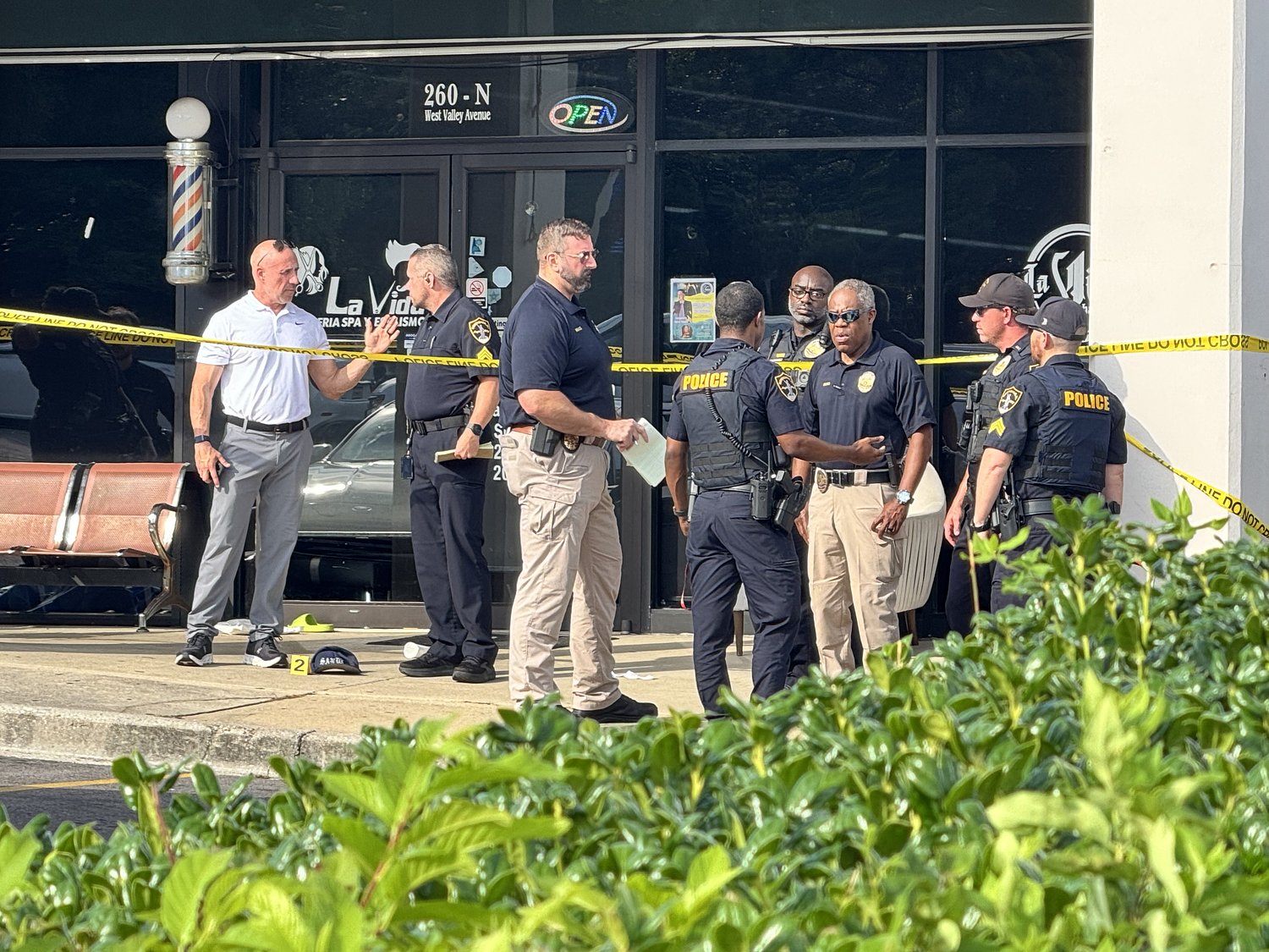 Father shot dead in front of family during argument at Birmingham barber shop