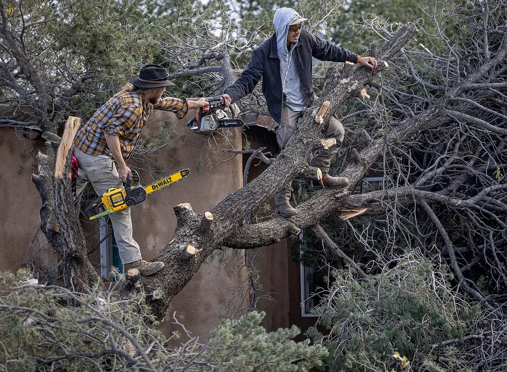 Flood warning lingers in Four Corners as soaked towns face sewage-tainted waters. 1 death reported