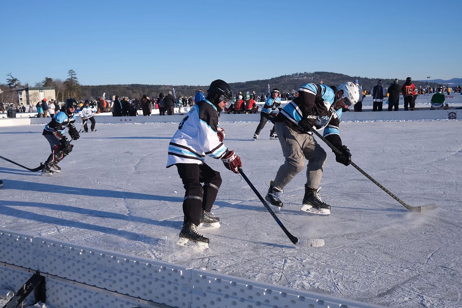 At pond hockey tournament on Lake Winnipesaukee, cold weather is a gift