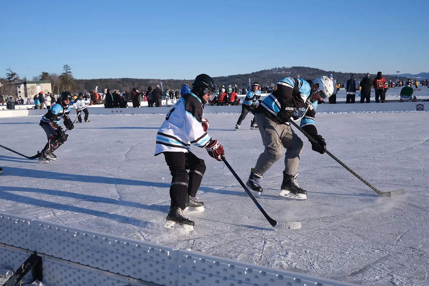 At pond hockey tournament on Lake Winnipesaukee, cold weather is a gift
