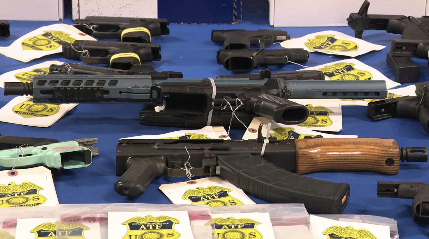 Nearly 1,500 guns seized, 20 people charged in major gang trafficking case