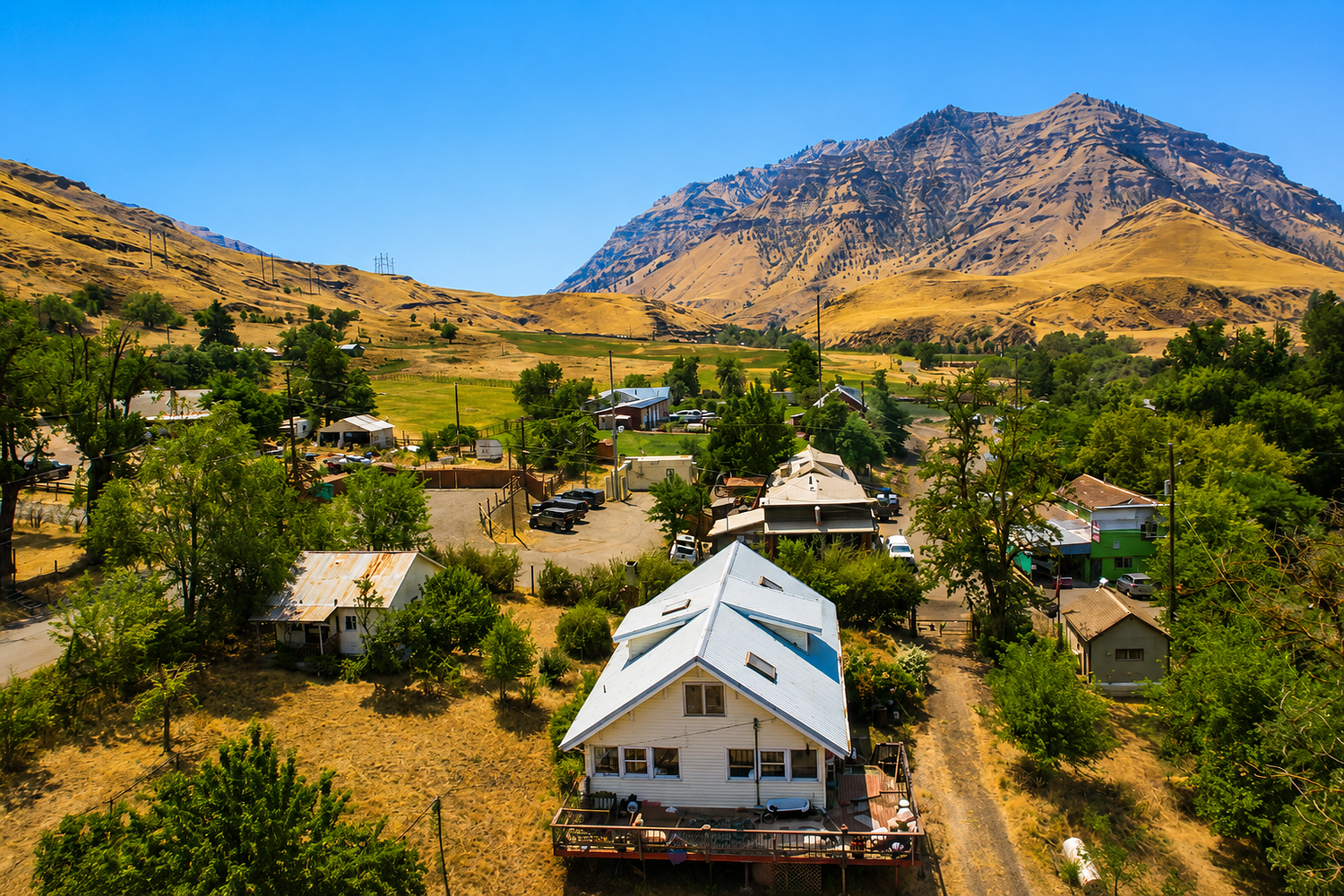 A riverside escape in Oregon’s ‘Swiss Alps’ for sale at $539K has a historic post office