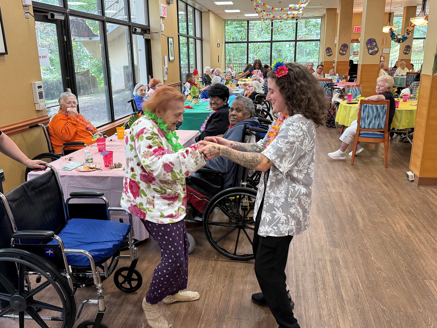 Aloha! Staten Island senior residents enjoy tropical getaway with staycation luau