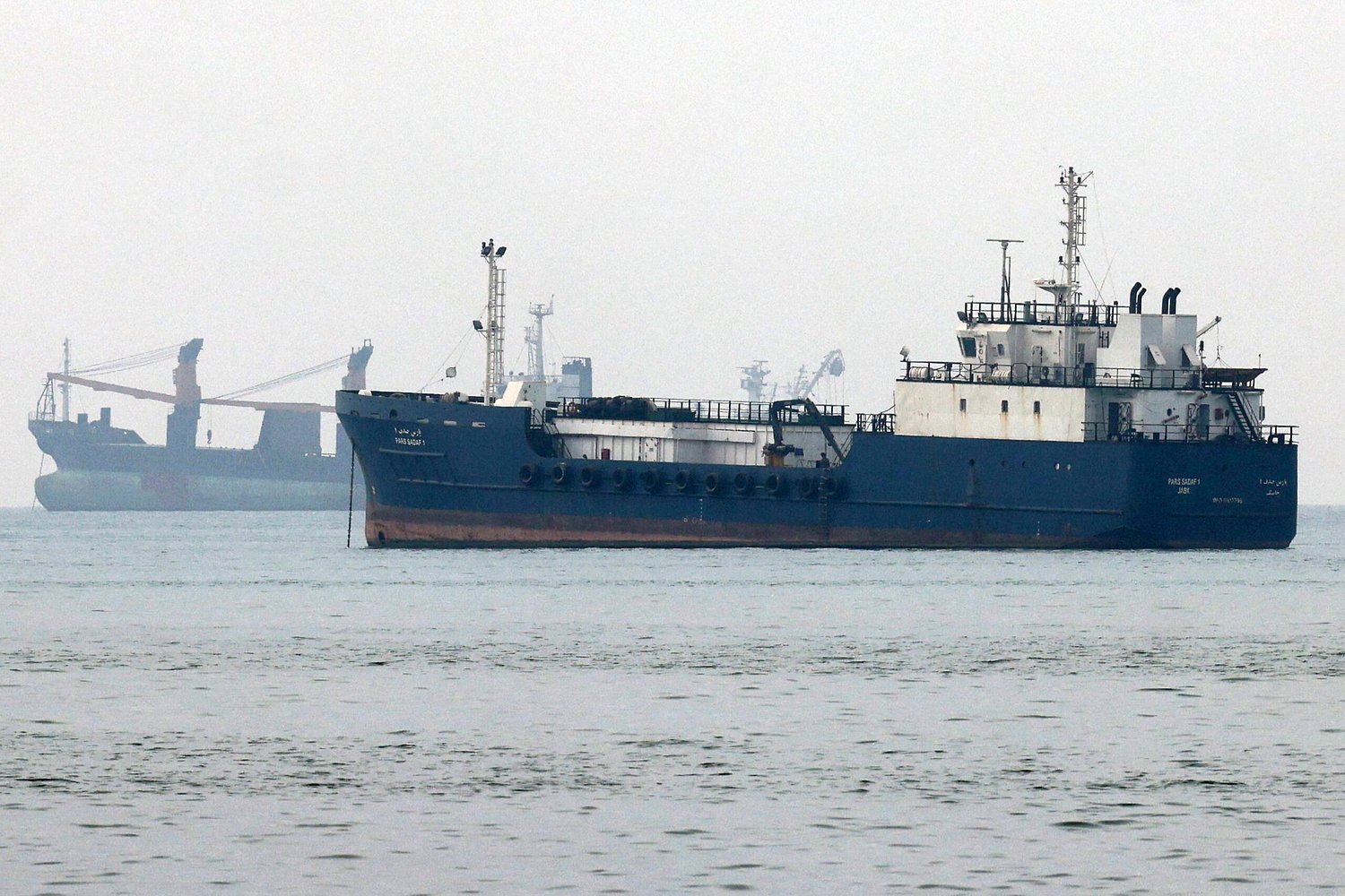 U.S. protection revives Hormuz oil traffic as debate shifts to how long it can last