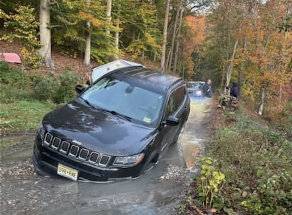 Sinkhole shutters N.J. road after SUV becomes stuck in muddy mess