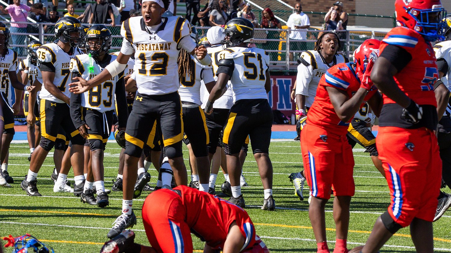 Senior QB sets passing record, team seals thrilling win with late goal line stand