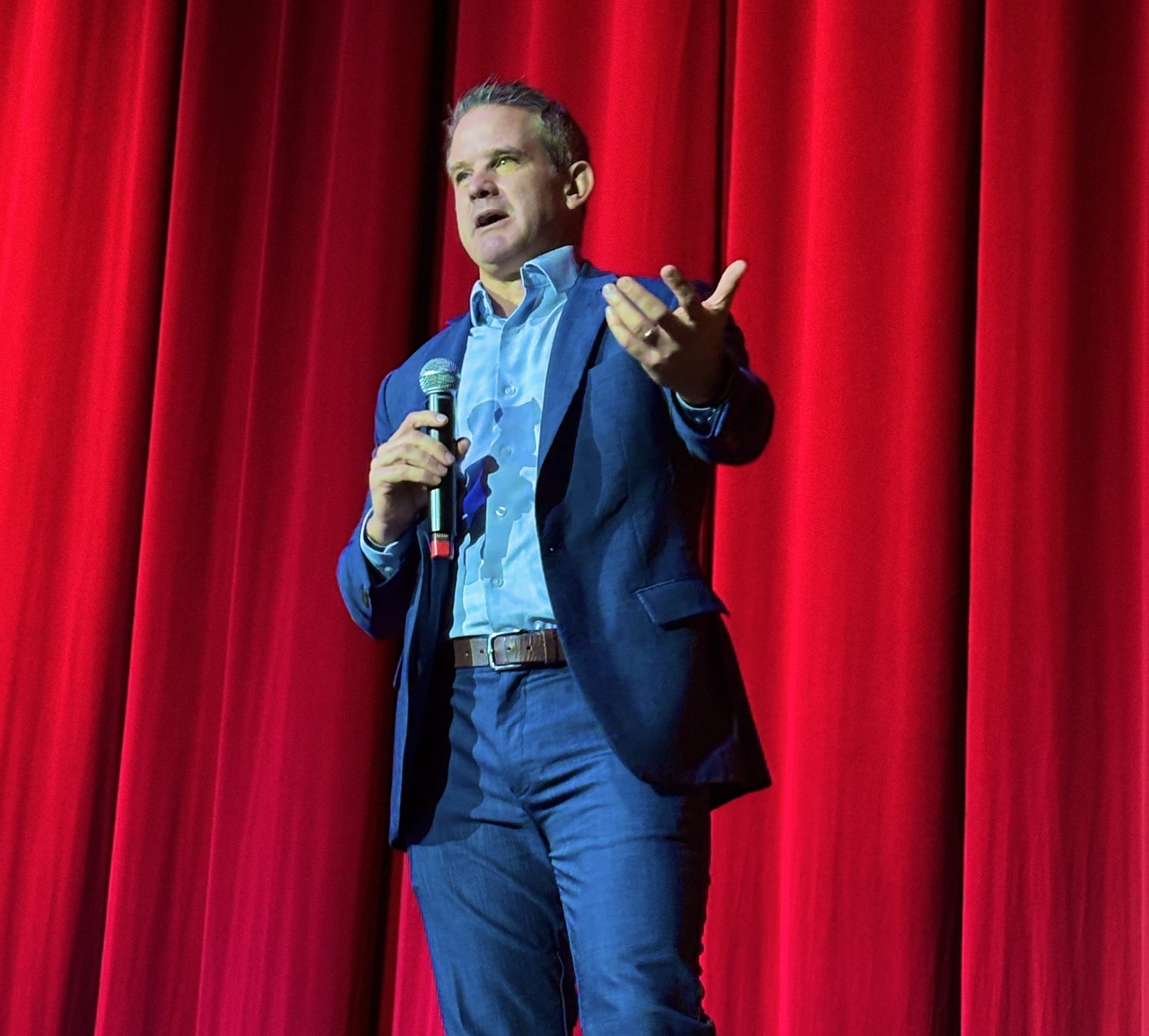 On stop in region, Adam Kinzinger warns apathy opens door to authoritarianism