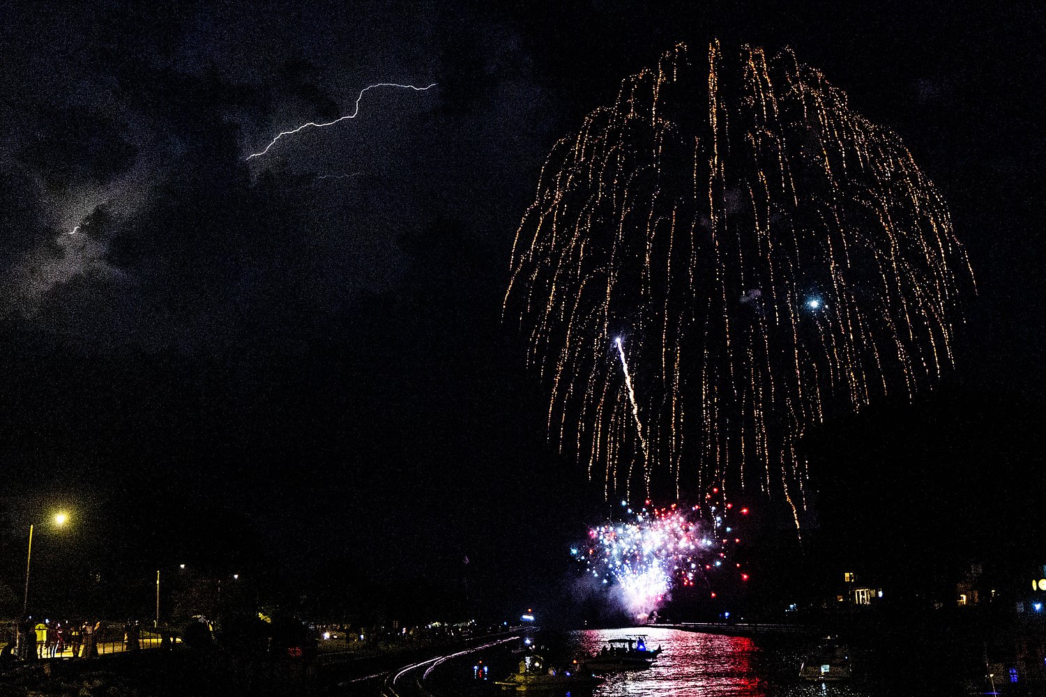 Lightning and fireworks duel as South Haven beachgoers brave storm for annual show