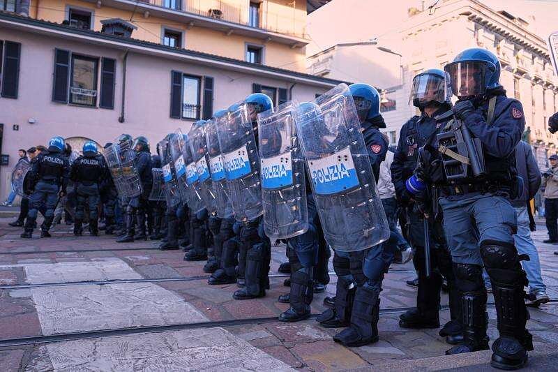 Soldiers guard center of Milan as thousands of protesters march in cities across Europe
