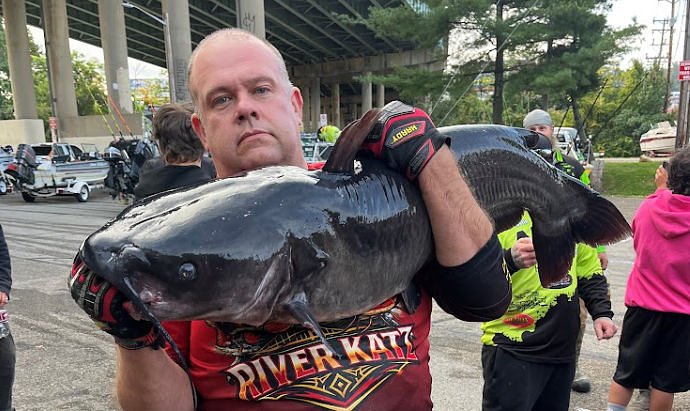 Angler catches massive catfish, breaks 35-year-old state fishing record