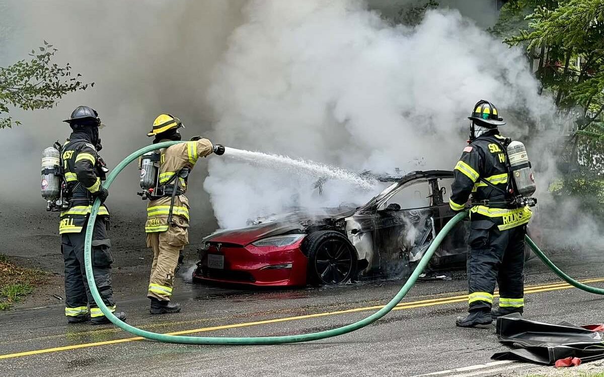 Flames consume Tesla in front of MDI fire station