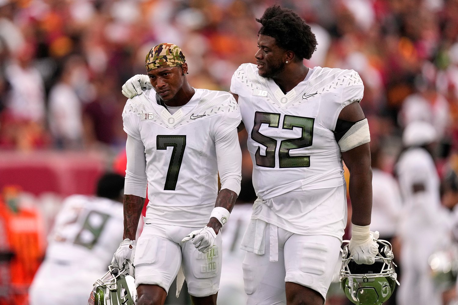 Dante Moore injury ‘lights a fire’ under Oregon players in win over USC
