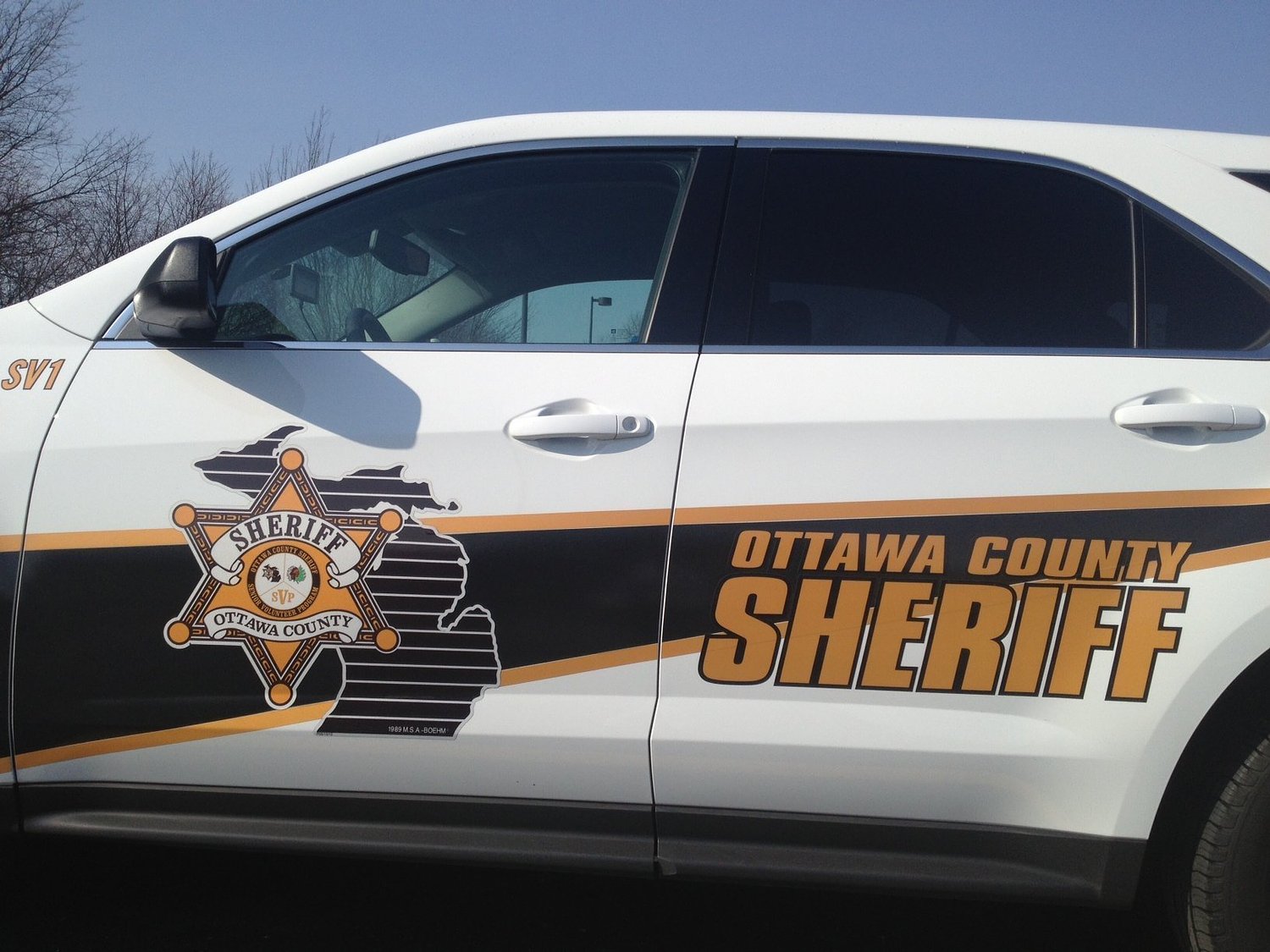 Hudsonville man hospitalized after crashing into Jamestown business