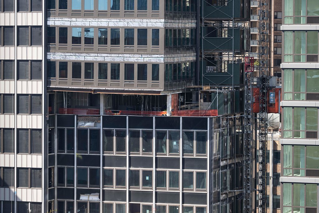 Some evacuation orders and street closures remain as work continues on a NYC high-rise that buckled