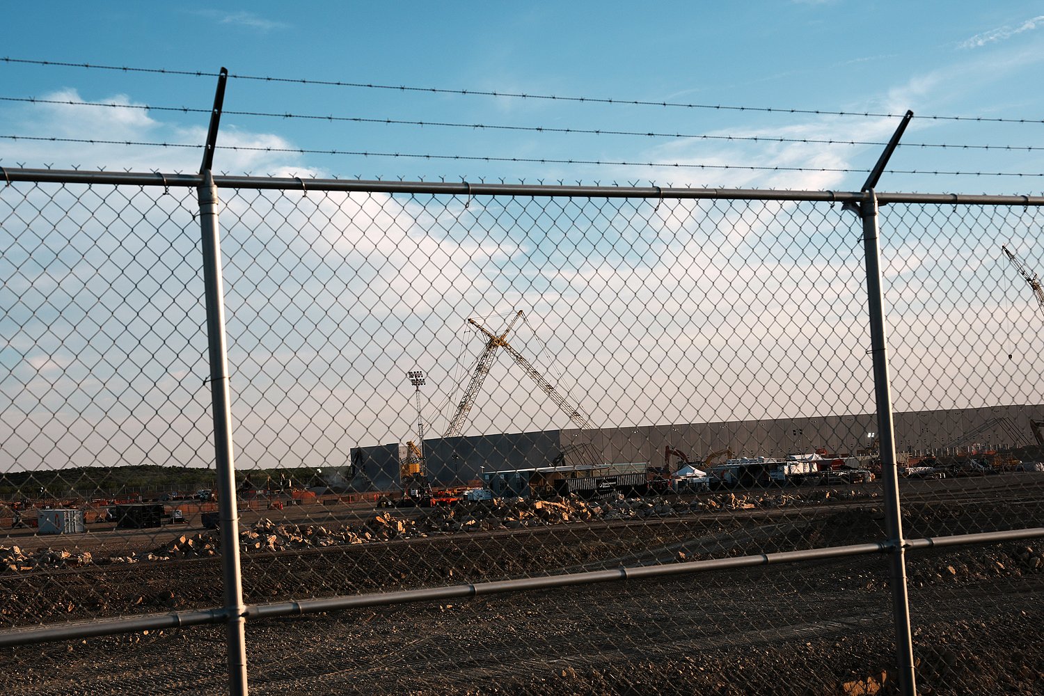Greg Abbott ordered a pause on data center permits. Critics say some plans still moved forward.
