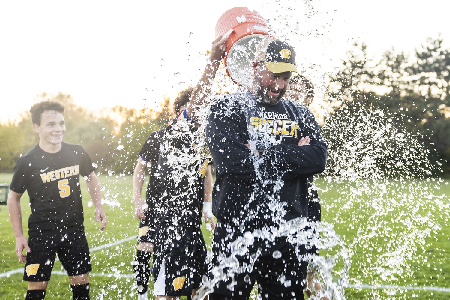 Western savors first soccer title in 12 years while giving coach record-breaking win