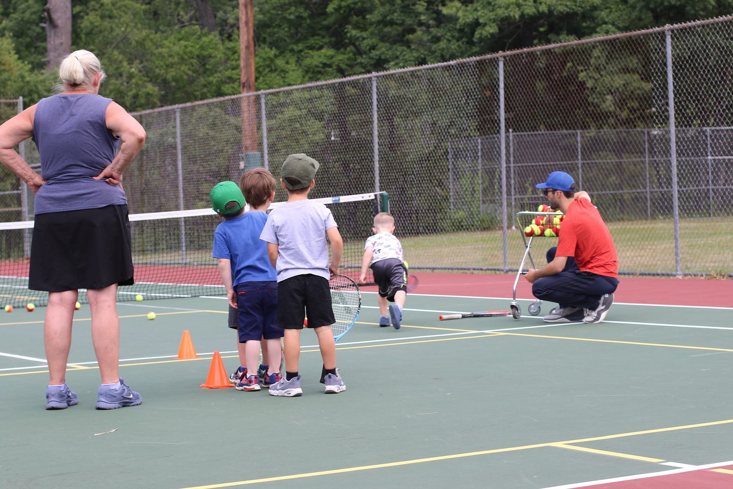 Tennis nonprofit gets kids 'outside, doing something and feeling safe'