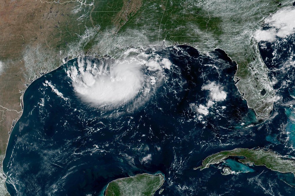 Coastal Louisiana and Texas warned of tropical storm as a potential hurricane moves toward Hawaii