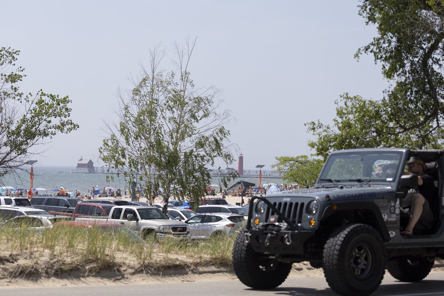 Gas prices shorten summer road trips, but Michigan beach town ranks #1 for one-tank travel