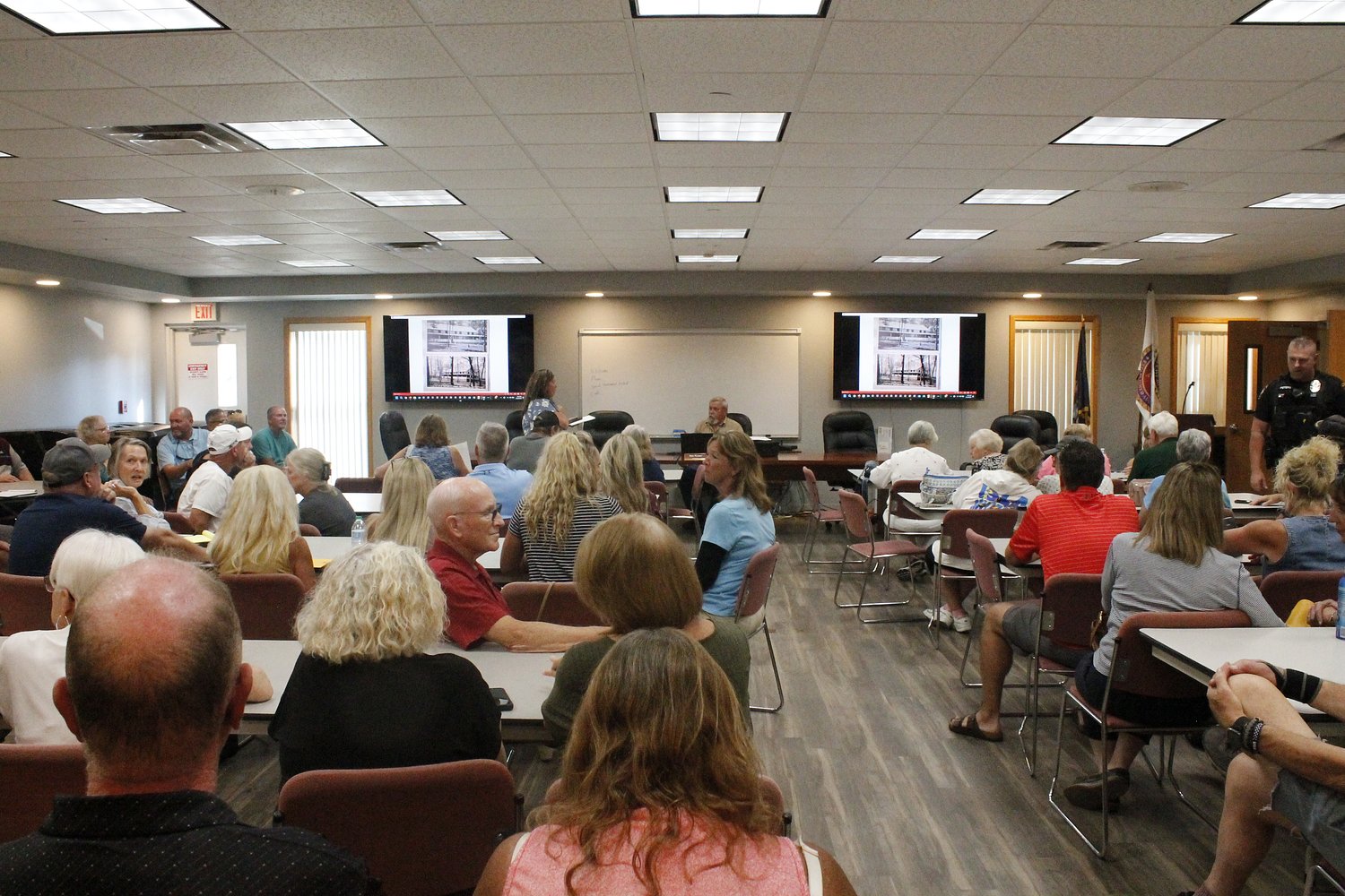 Napoleon residents protest dock removal enforcement at packed meeting