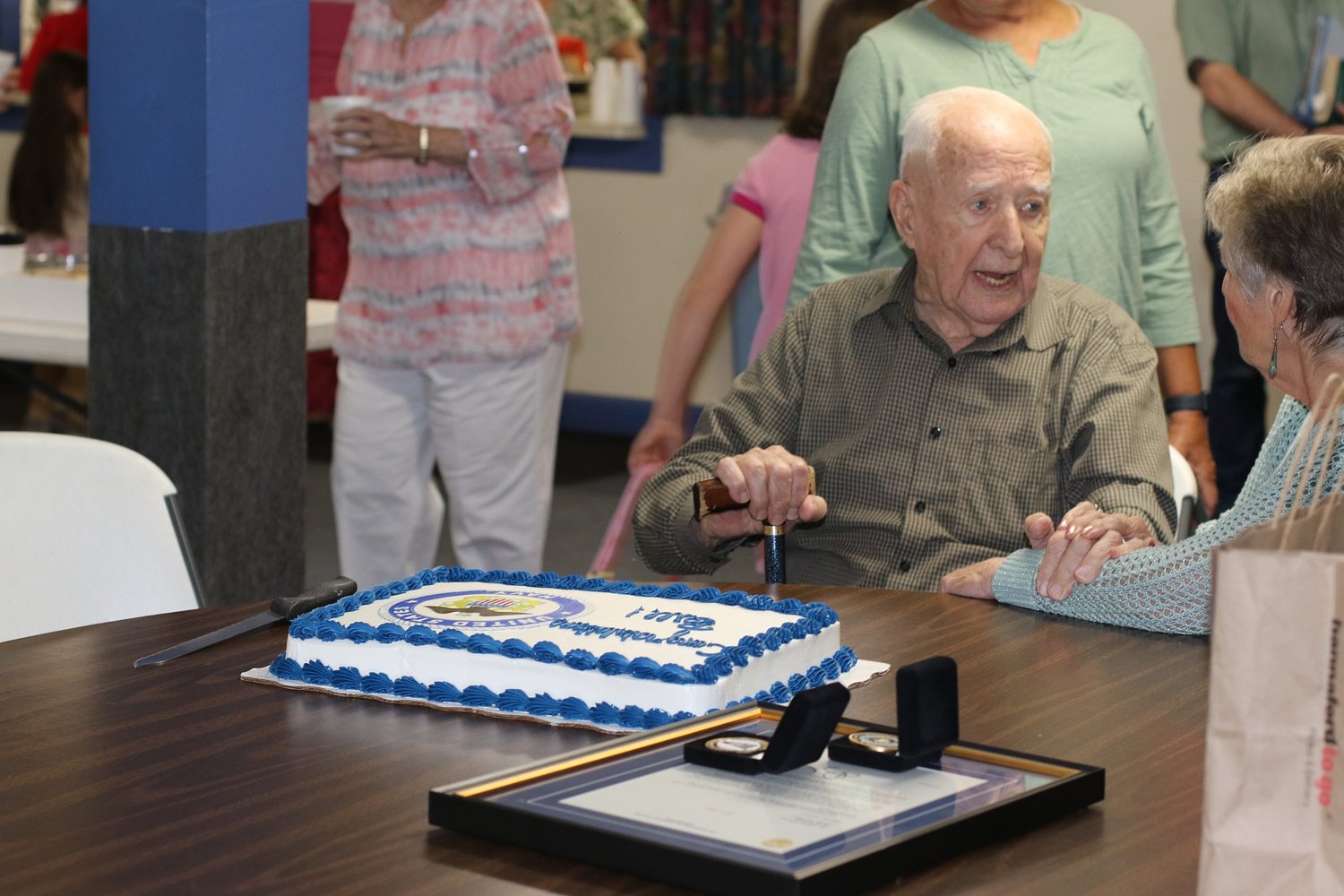 'We're still here': 100-year-old WWII veteran receives honor for service and longevity