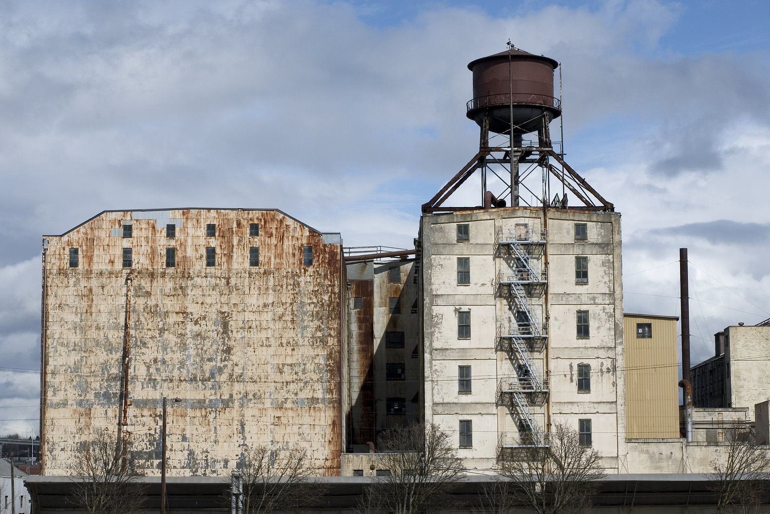 Good Morning, News: City Helped Urban Alchemy Polish Icky Image, Moda Center Negotiations Begin, and Centennial Mills Water Tower Will Come Tumblin’ Down. By William Steven Humphrey.
