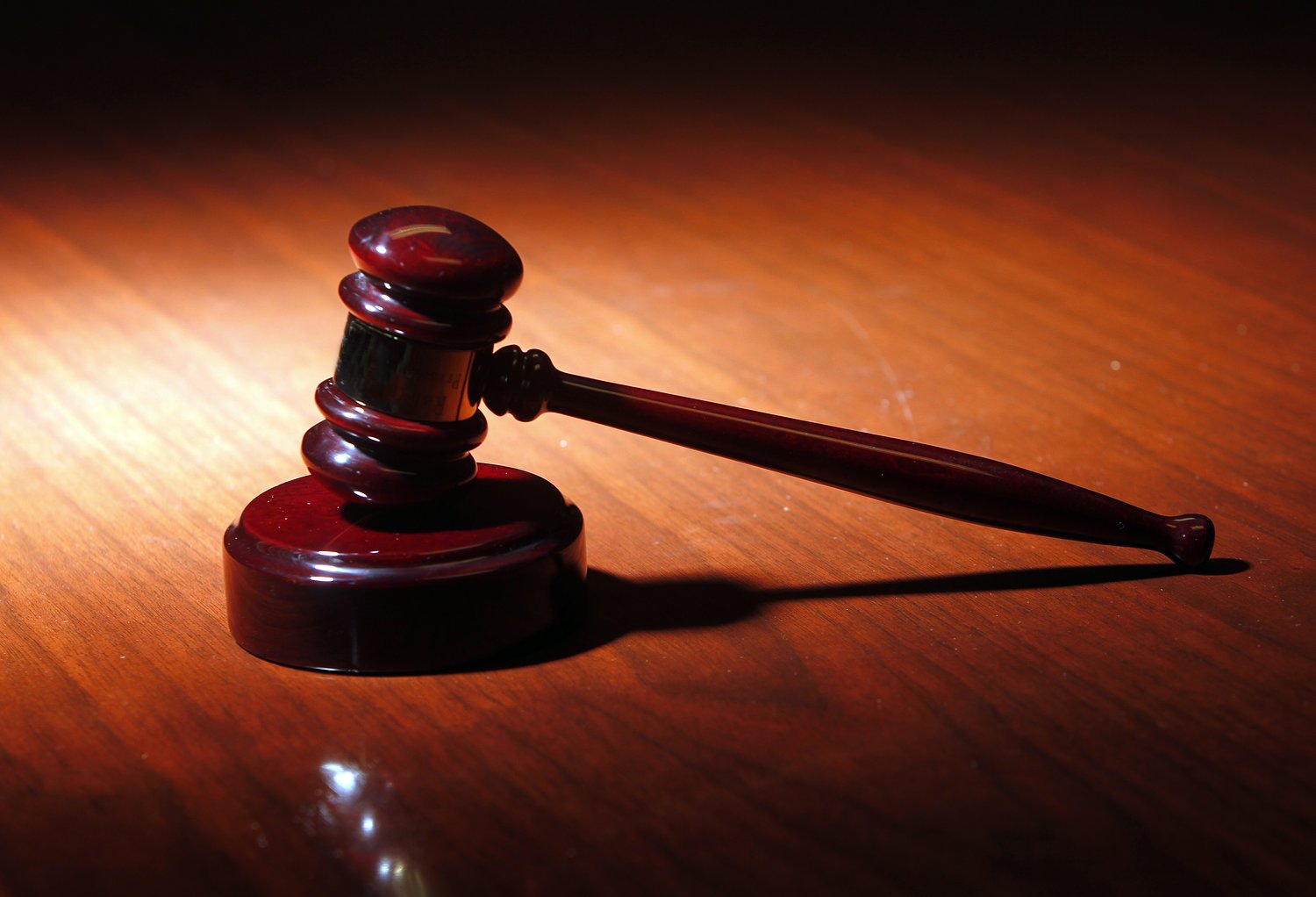 Muslim employee accosted at knifepoint, found bacon bits sprinkled on his desk. Town paid him $100K.