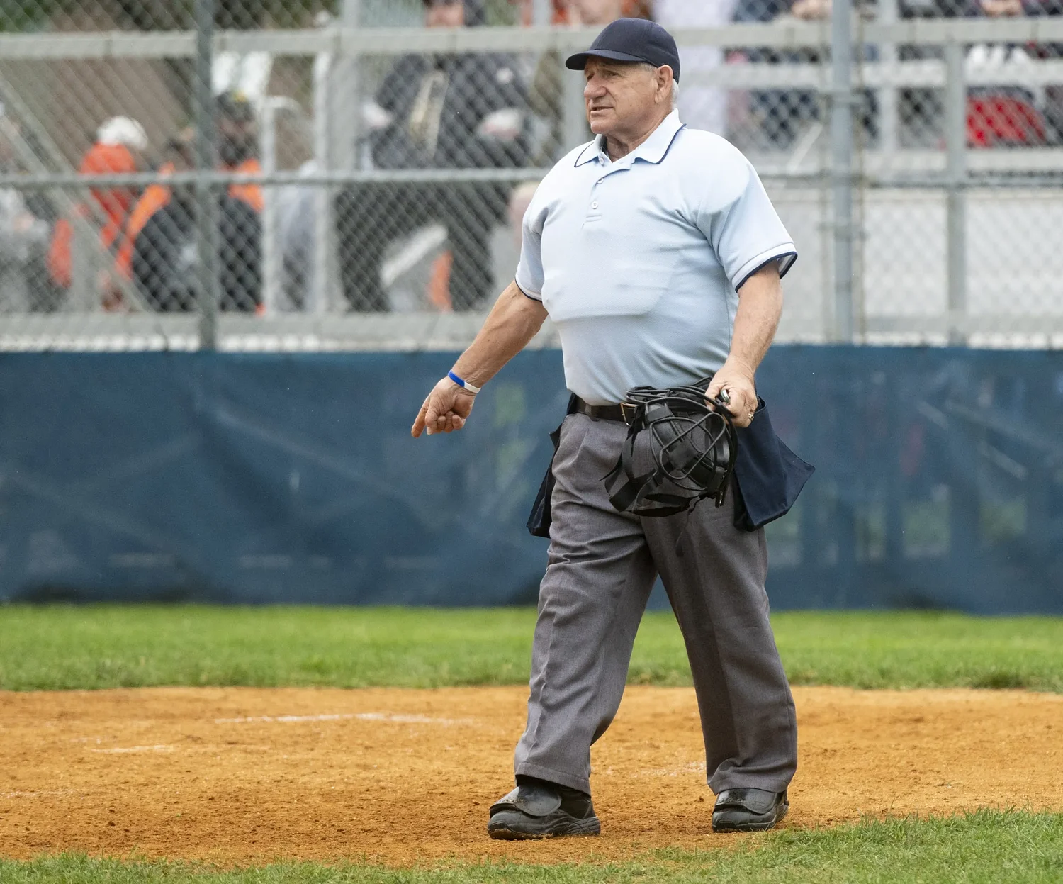 A career worth the call: After 52 years in four sports, umpire Rene Arsenault hangs up his gear