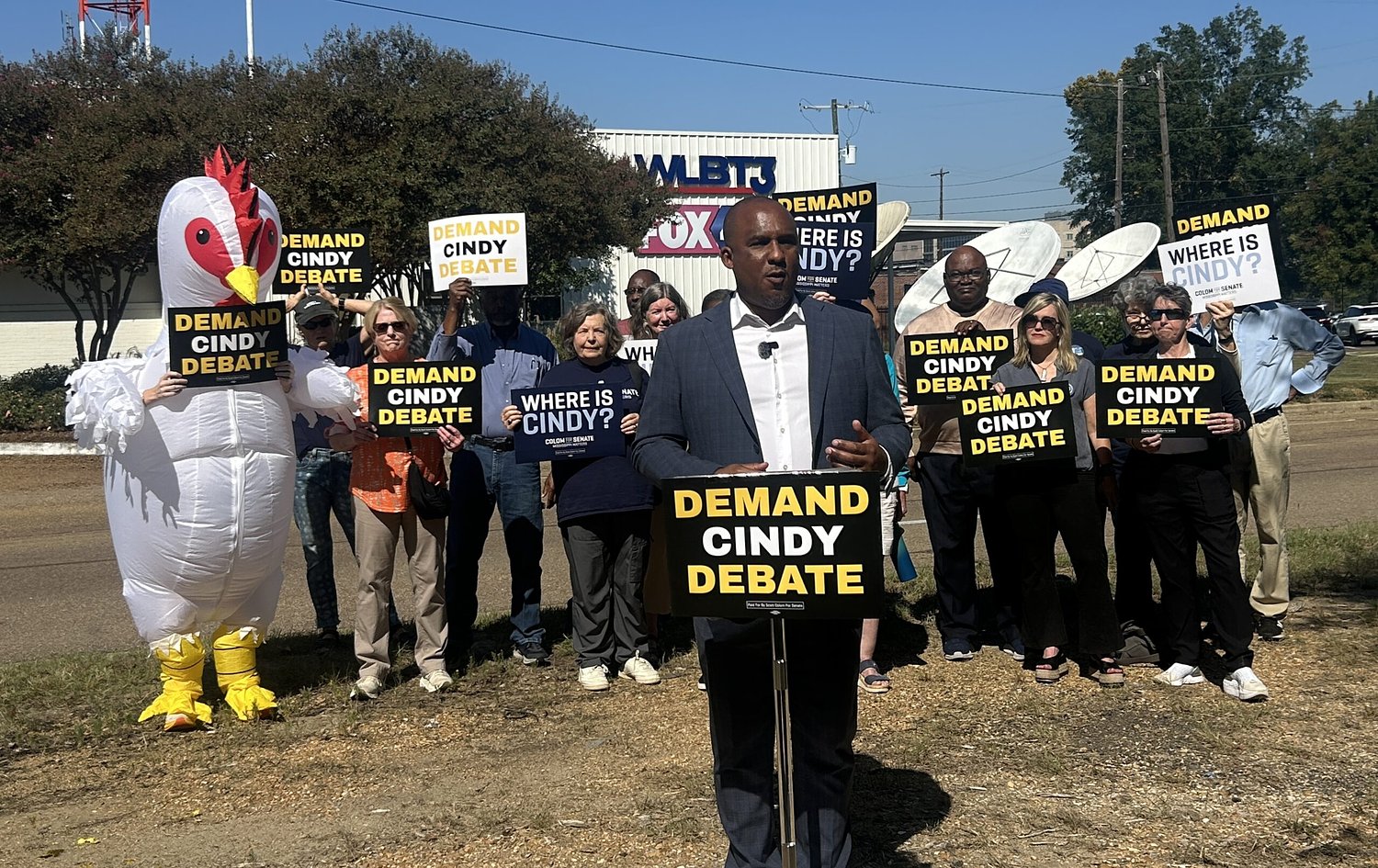 Colom challenges Hyde-Smith to debates, calls her 'chicken'