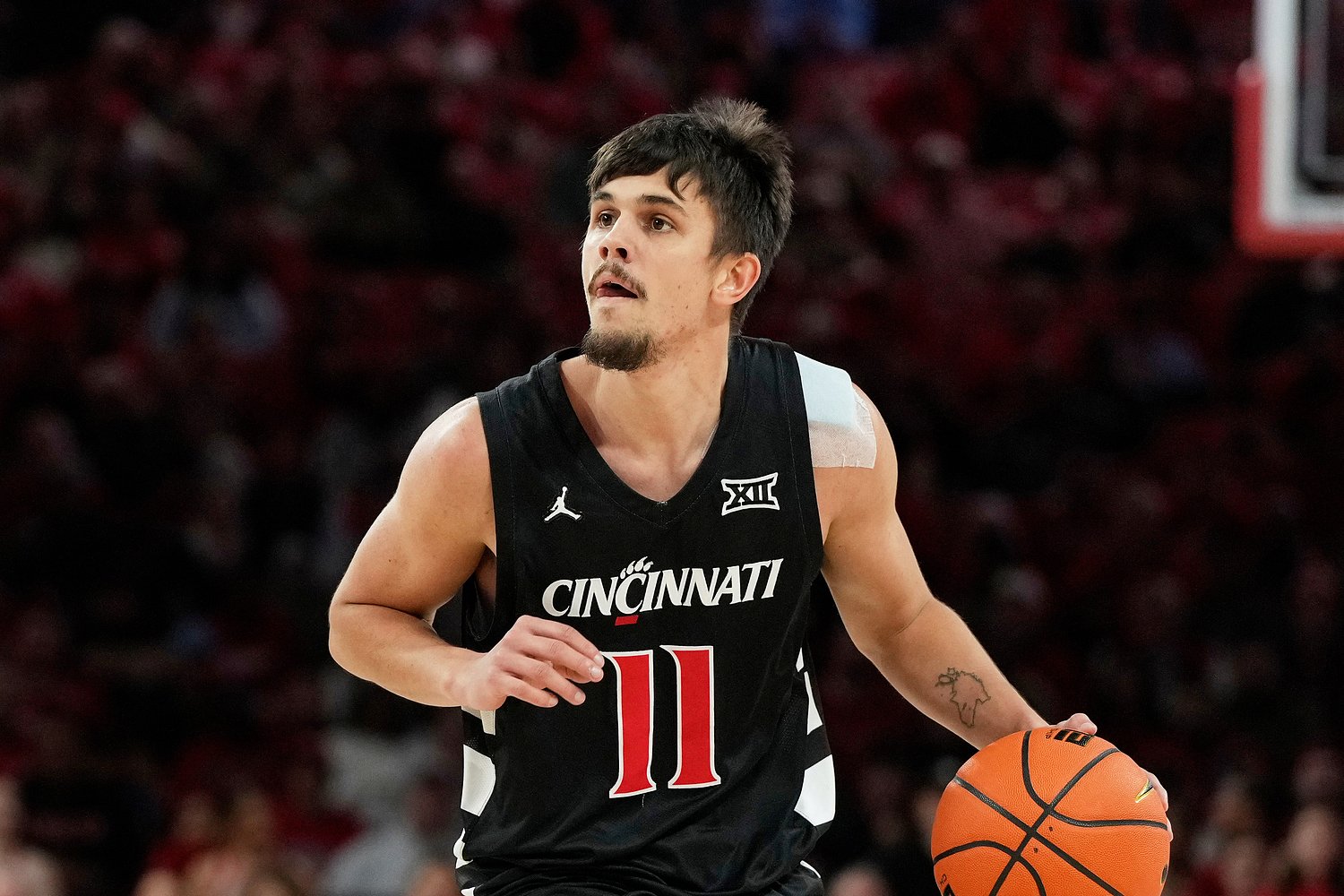 Ex-college basketball player used fake identities in $2.2 million fraud scam, DOJ says