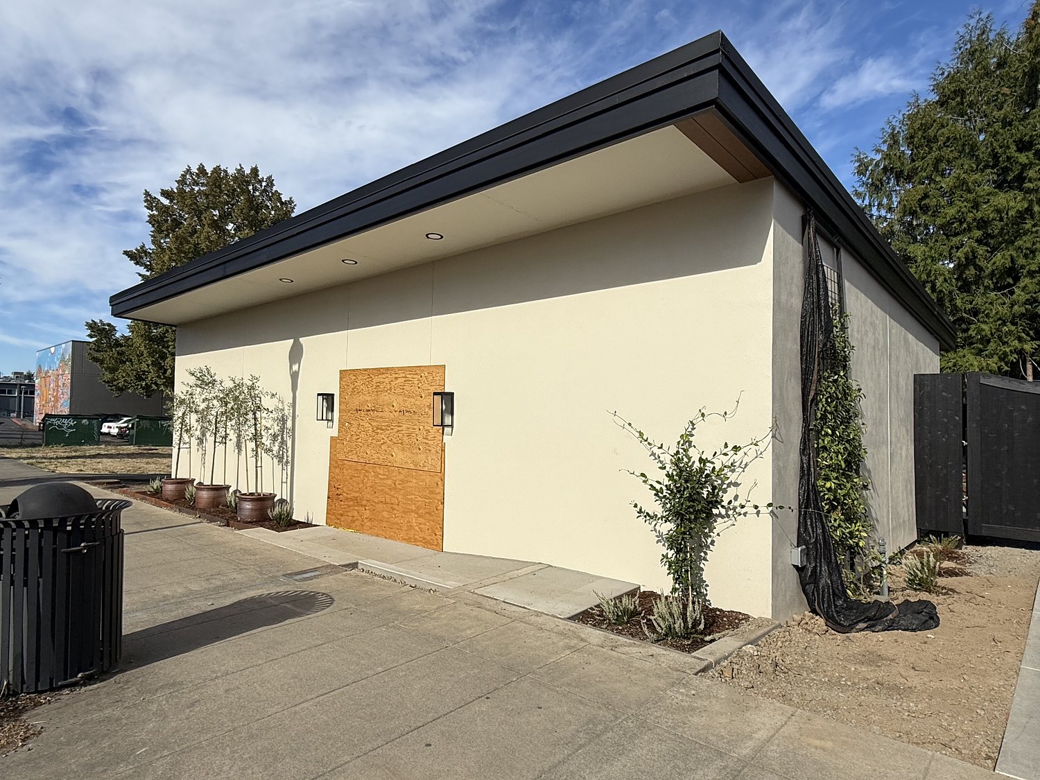 A new hidden garden venue is taking shape next to a popular Milwaukie cocktail bar