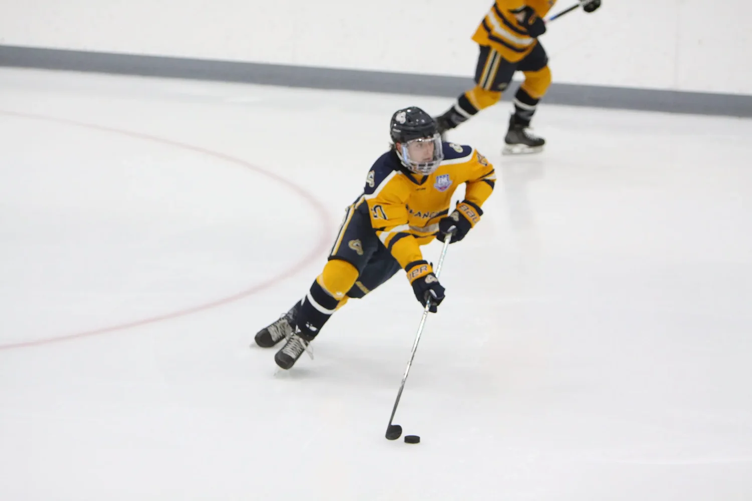 Canaan's Ballard helps juniors team win hockey championship